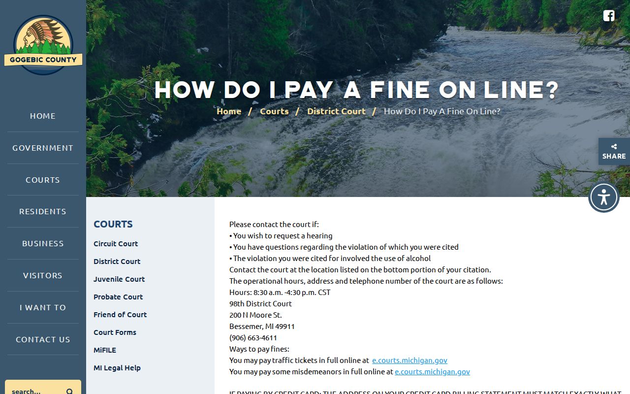 Gogebic County fine payment page showing payment consequences and court contact for traffic warrants