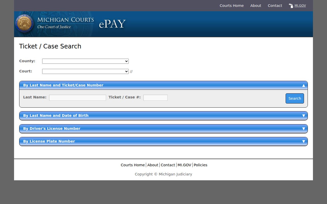 Michigan traffic ticket search page with county, court, and name fields used for Wakefield warrant checks